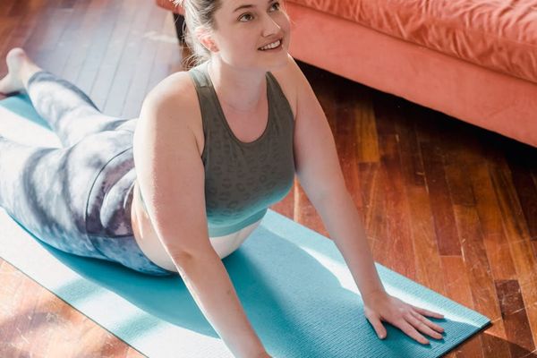 Young person feeling energetic and refreshed after morning yoga practice